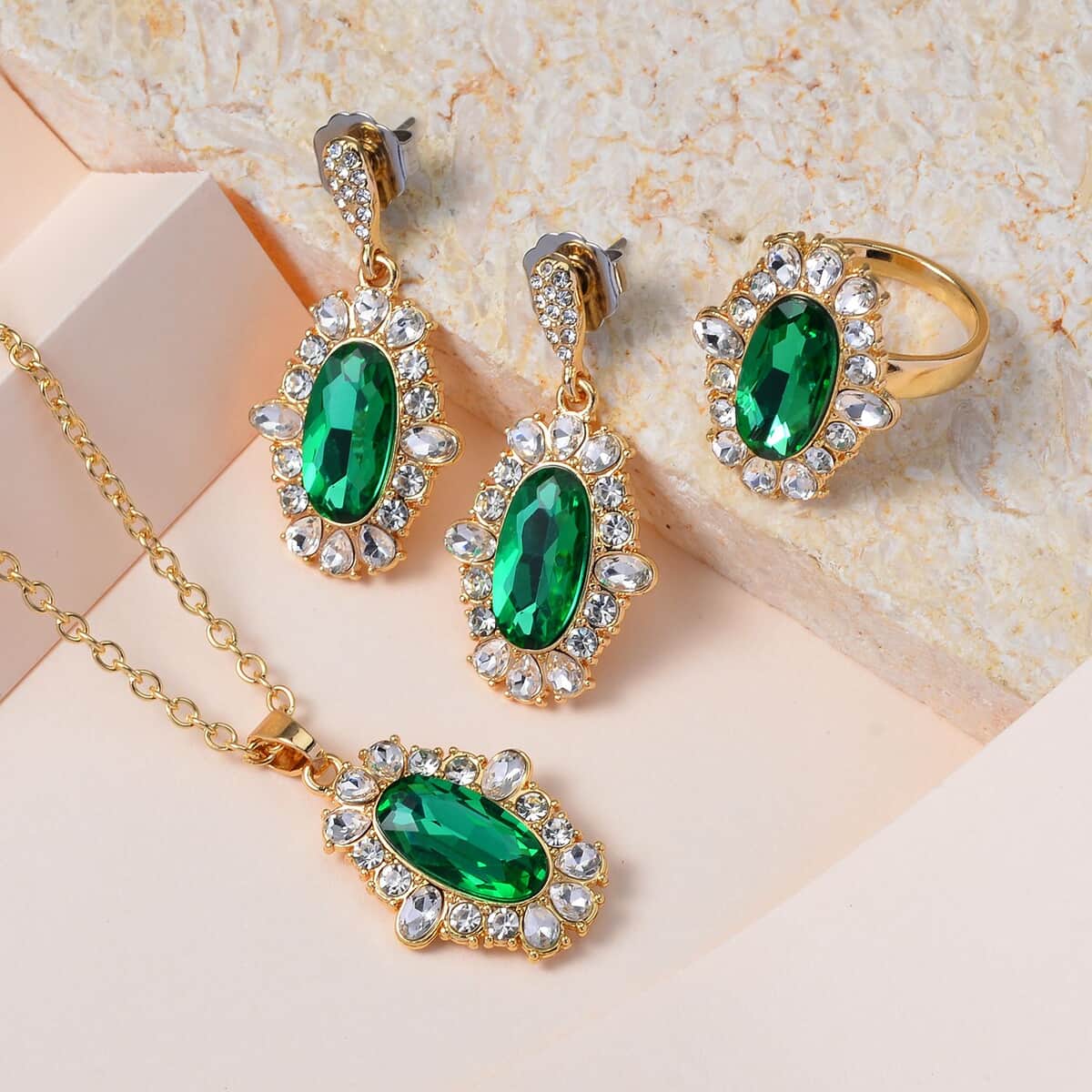 Simulated Emerald, Austrian Crystal Halo Ring (Size 6.00), Earrings and Pendant Necklace in Goldtone 20-22 Inches image number 1