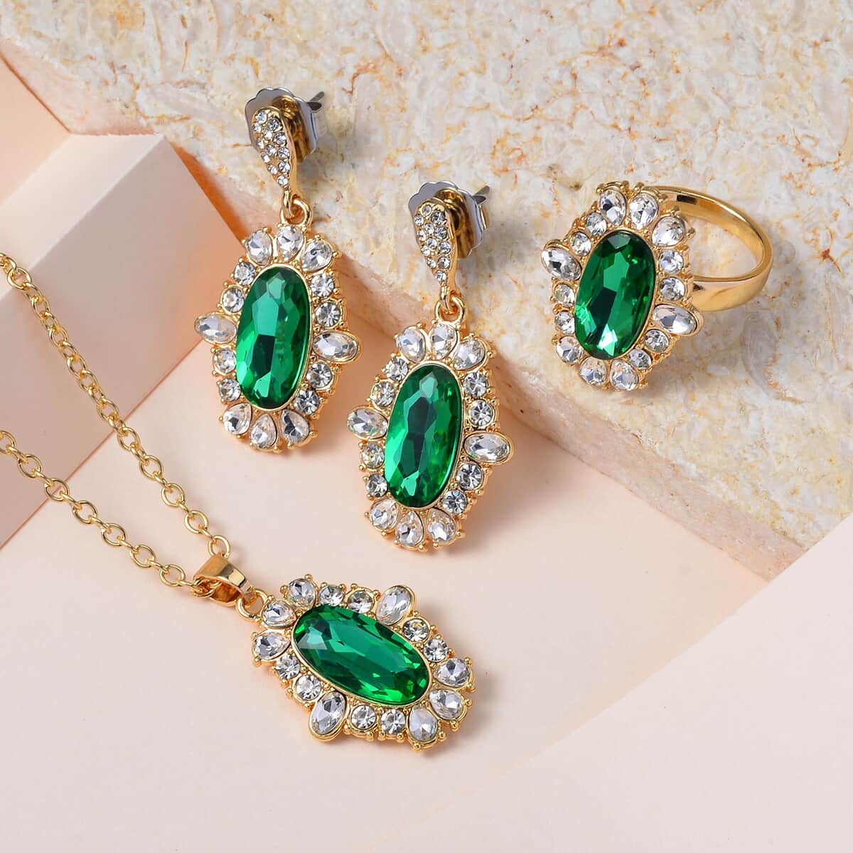 Simulated Emerald, Austrian Crystal Halo Ring (Size 7.00), Earrings and Pendant Necklace in Goldtone 20-22 Inches image number 1