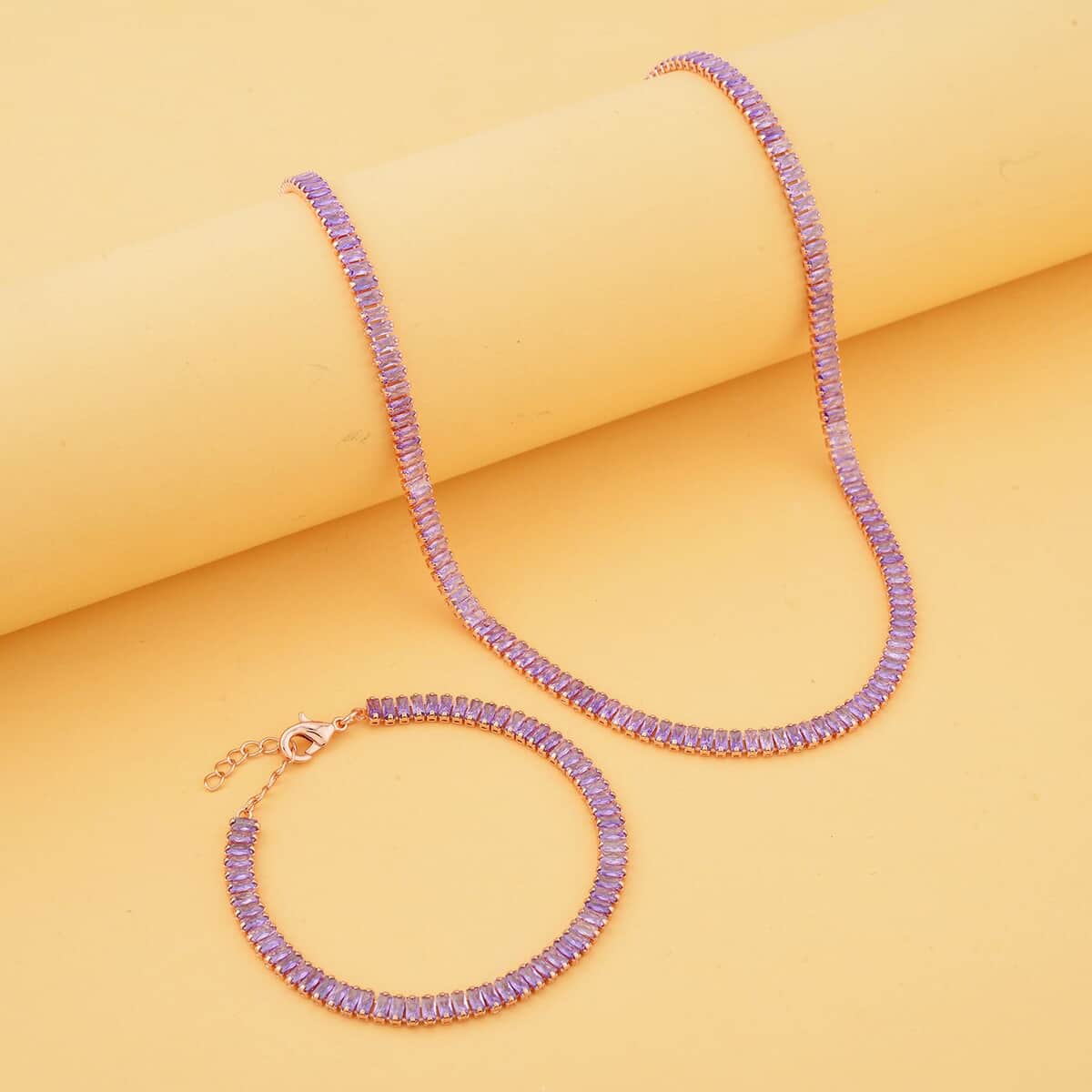 Simulated Amethyst Color Diamond Tennis Bracelet (6.75-8.75In) and Necklace 16.5-19.5 Inches in Rosetone 50.00 ctw image number 1