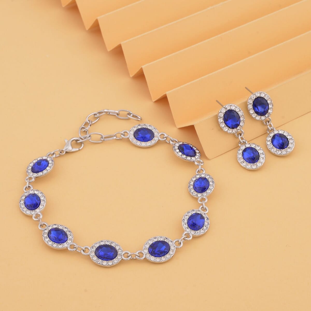 Simulated Blue Sapphire and White Austrian Crystal Bracelet (7.50In) and Earrings in Silvertone image number 1