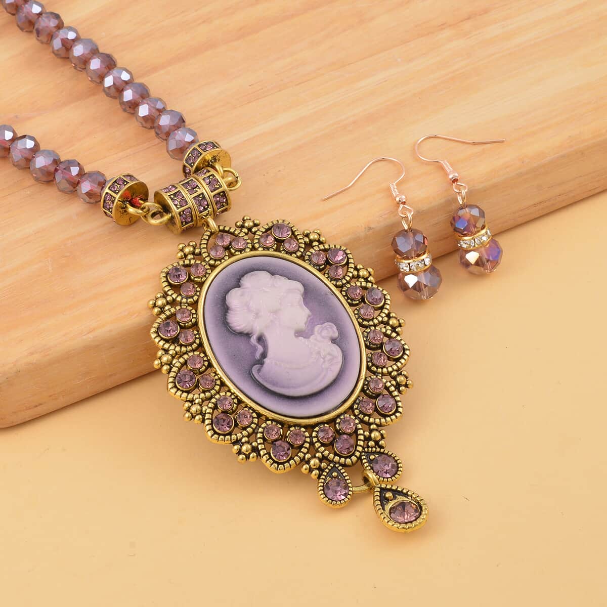 Cameo and Purple Magic Color Glass Earrings and Necklace 22 Inches in Goldtone 15.00 ctw image number 1