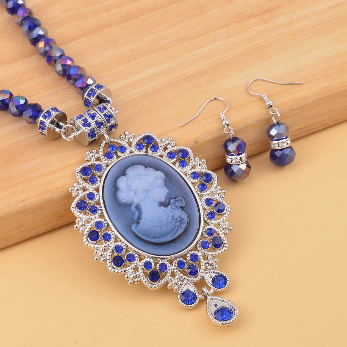 Cameo and Blue Magic Color Glass Earrings and Necklace 22 Inches in Silvertone 15.00 ctw image number 1