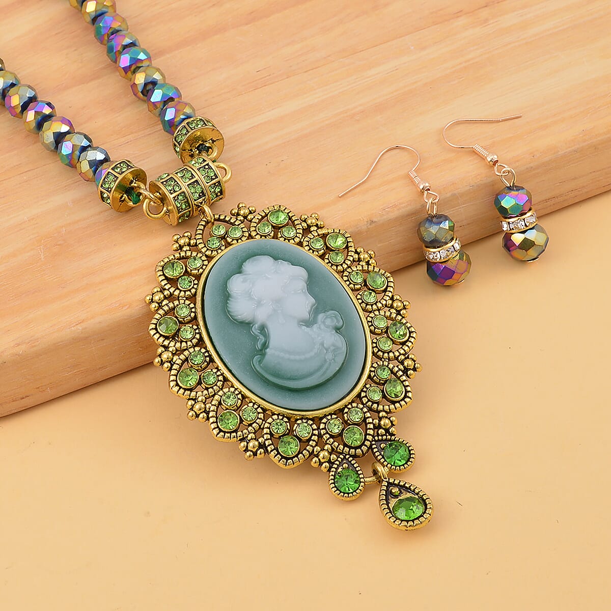 Cameo and Green Magic Color Glass Earrings and Necklace 22 Inches in Goldtone 15.00 ctw image number 1