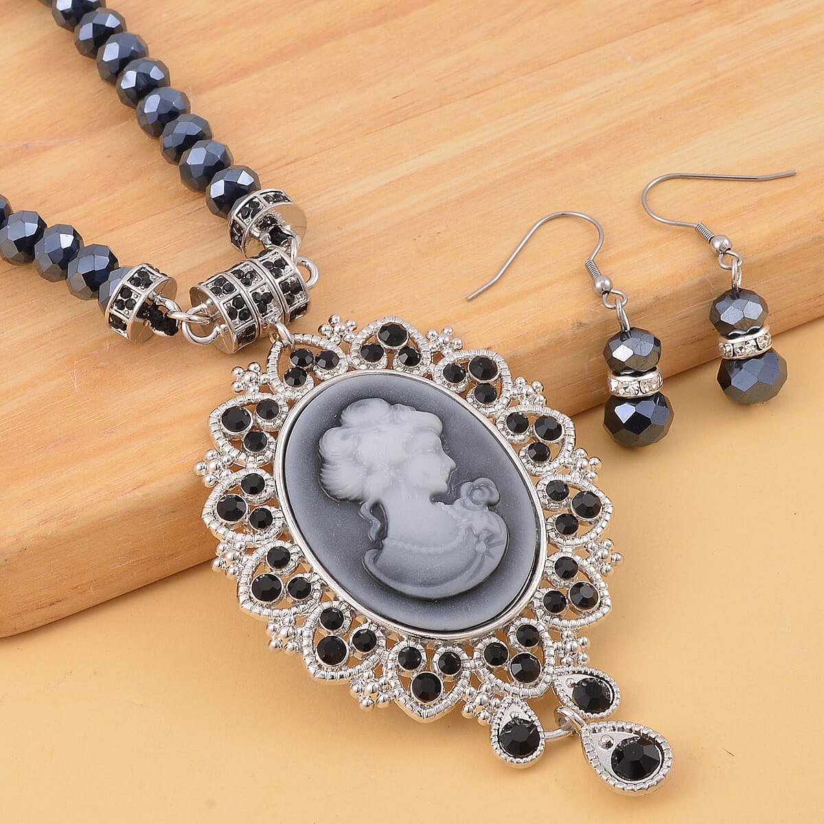 Cameo and Black Magic Color Glass Earrings and Necklace 22 Inches in Silvertone 15.00 ctw image number 1