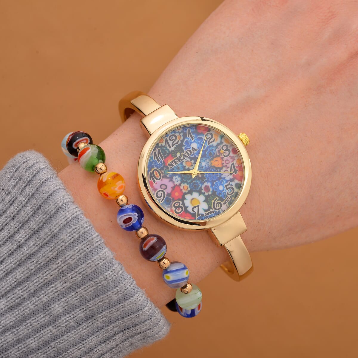 Strada Japanese Movement Murano Pattern Dial Watch in Goldtone and Murano Style and Resin Beaded Stretch Bracelet (6.5-7.5In) image number 1