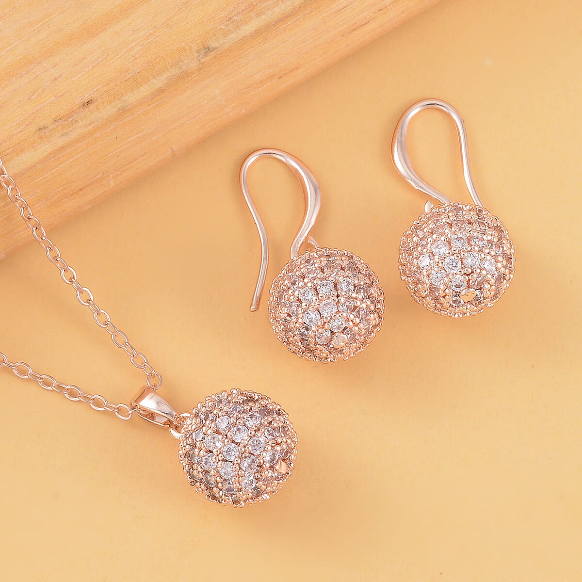 Simulated Diamond Earrings and Pendant Necklace 20-22 Inches in Rosetone 1.20 ctw image number 1