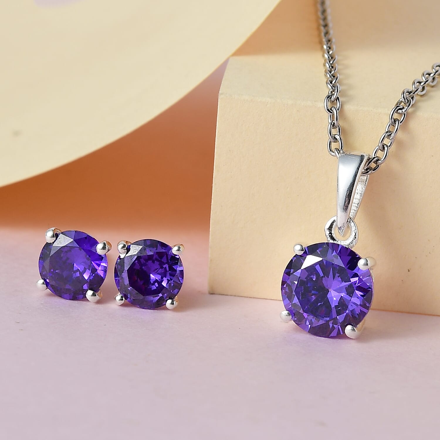 Buy Simulated Purple Diamond Solitaire Stud Earrings and Buy Simulated Purple Diamond Solitaire Stud Earrings and