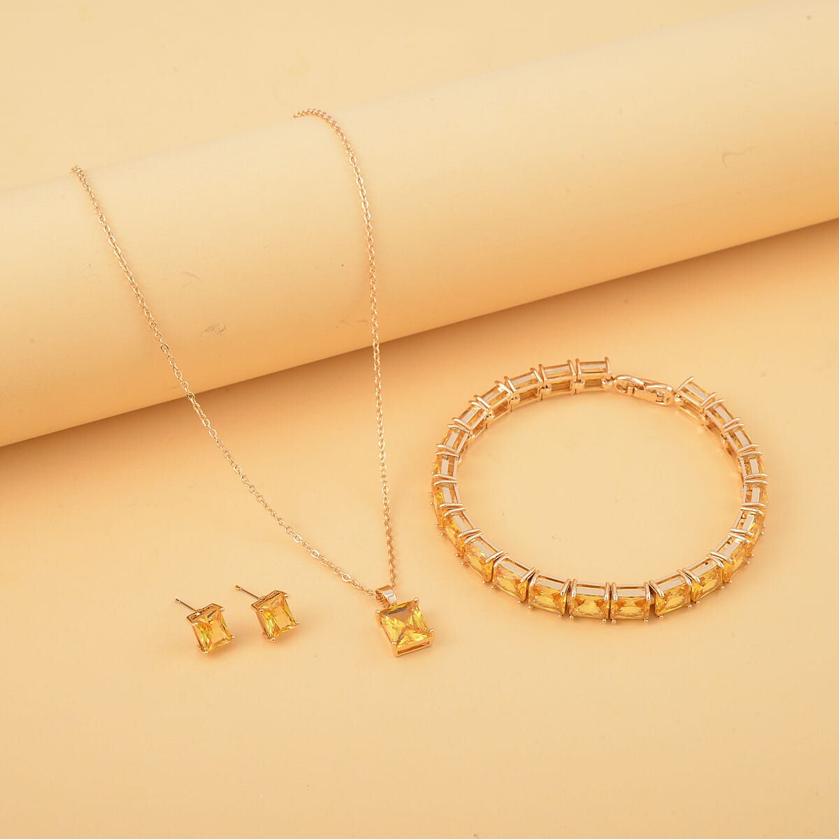 Yellow Austrian Crystal Tennis Bracelet (8.0In), Stud Earrings and Pendant Necklace 20 Inches in Goldtone image number 1