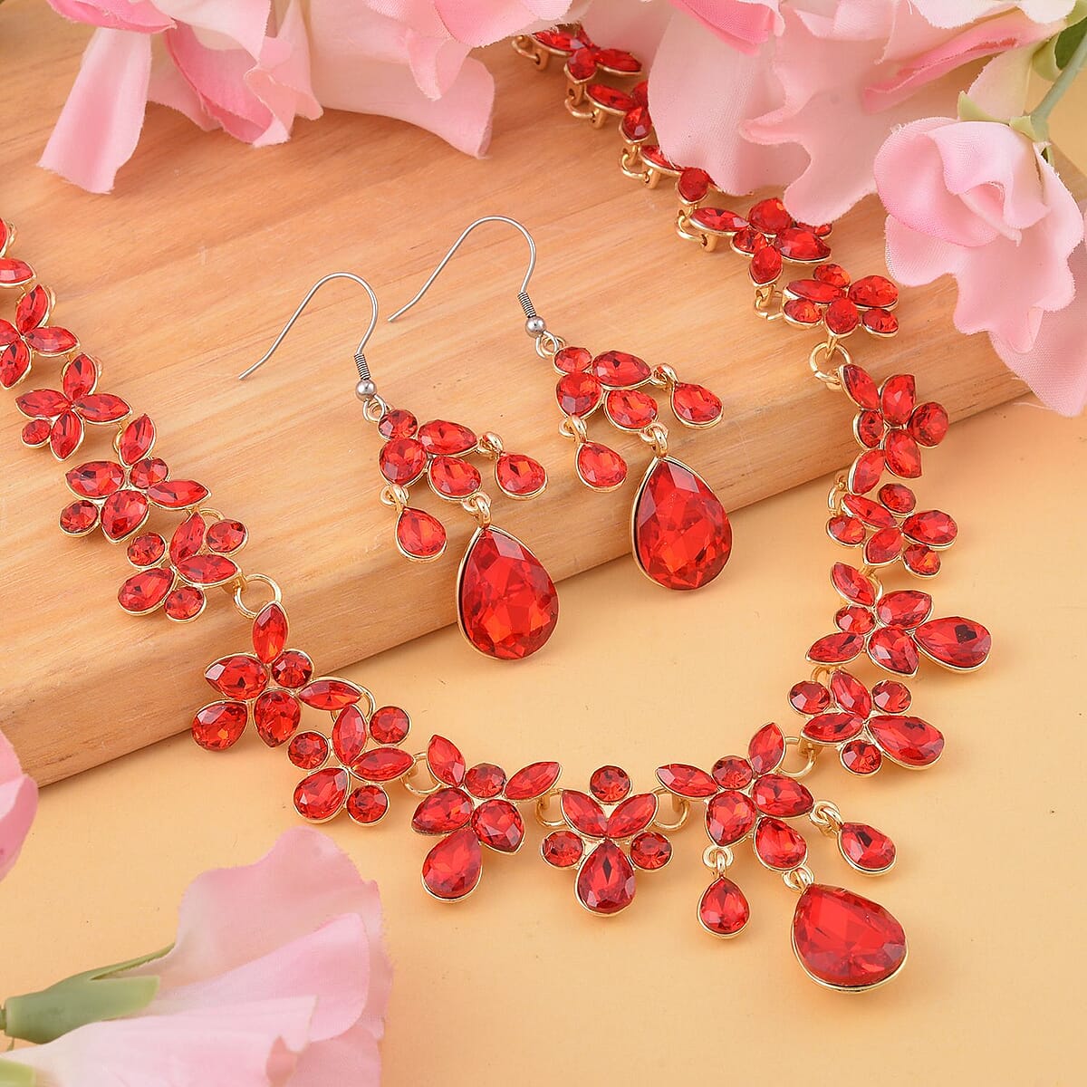 Red Austrian Crystal Dangle Earrings and Necklace 20-22 Inches in Goldtone image number 1