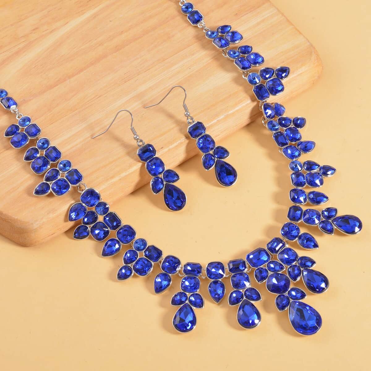 Blue Mystic Austrian Crystal Necklace 20-23 Inches and Dangle Earrings in Silvertone image number 1