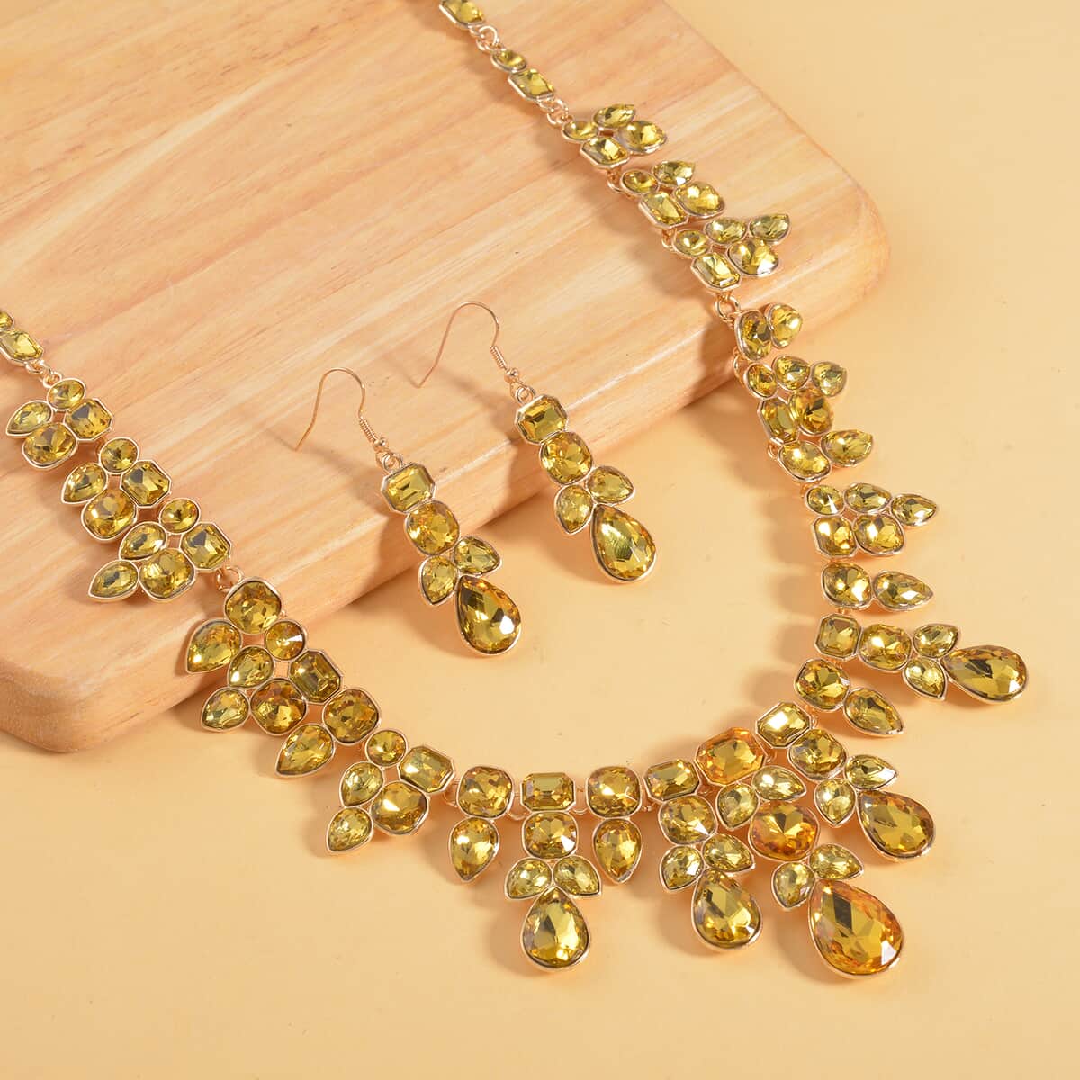 Yellow Austrian Crystal Necklace (20-23 Inches) and Dangle Earrings in Goldtone image number 1