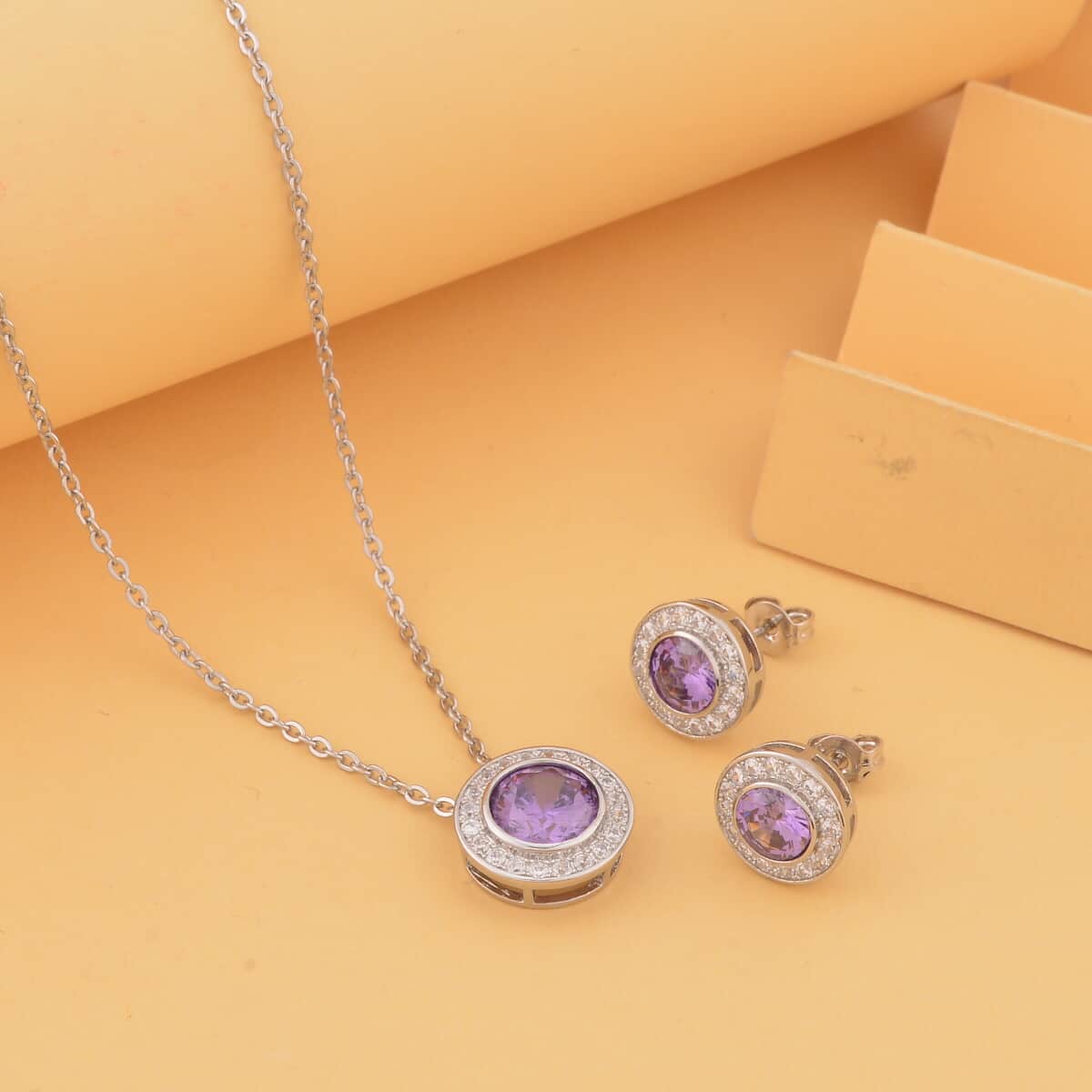 Simulated Purple Diamond, Simulated Diamond Halo Pendant Necklace 20 Inches and Stud Earrings in Silvertone 7.10 ctw image number 1