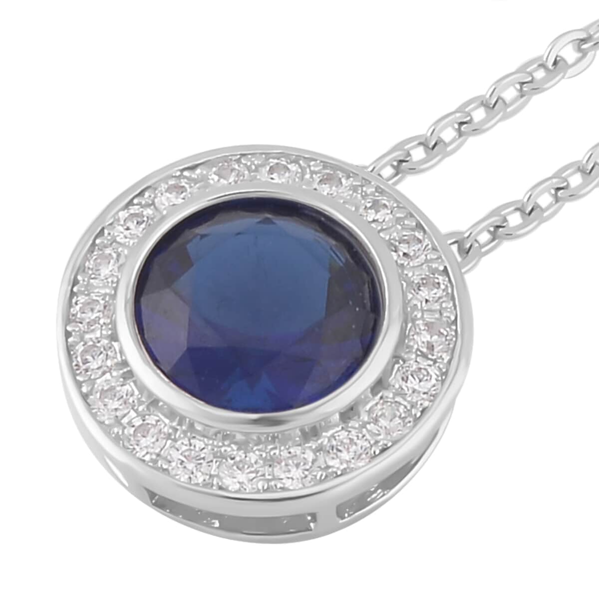 Simulated Blue Sapphire, Simulated White Diamond Halo Pendant Necklace 20 Inches and Stud Earrings in Silvertone 7.10 ctw image number 3