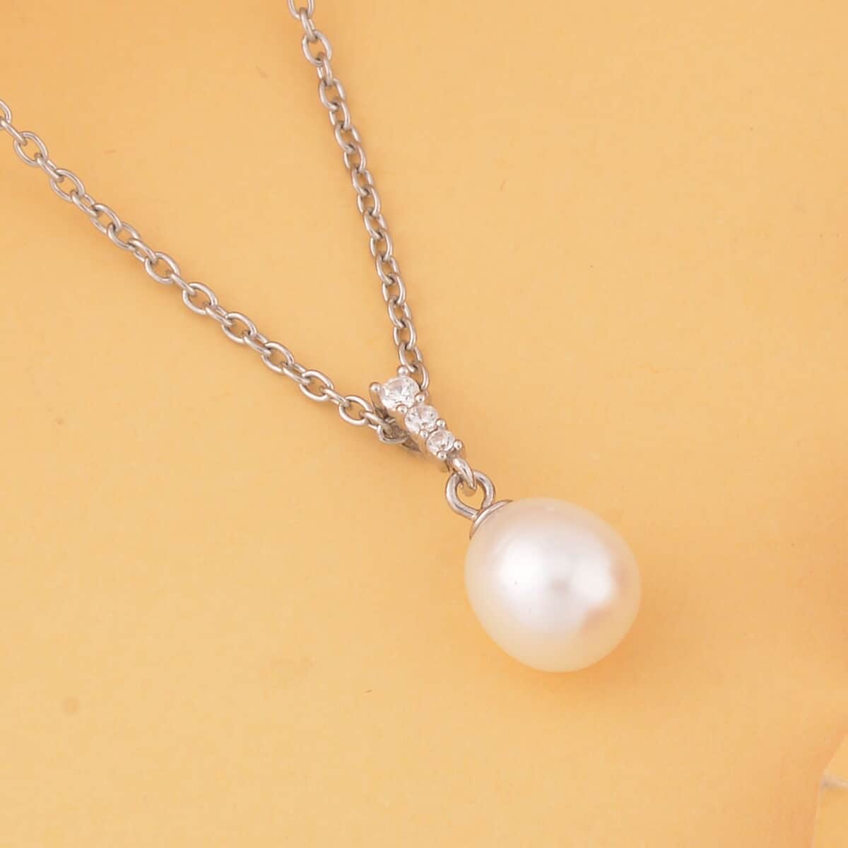 Freshwater Cultured Pearl and Simulated Diamond Pendant in Rhodium Over Sterling Silver with Stainless Steel Necklace 20 Inches 0.11 ctw image number 1