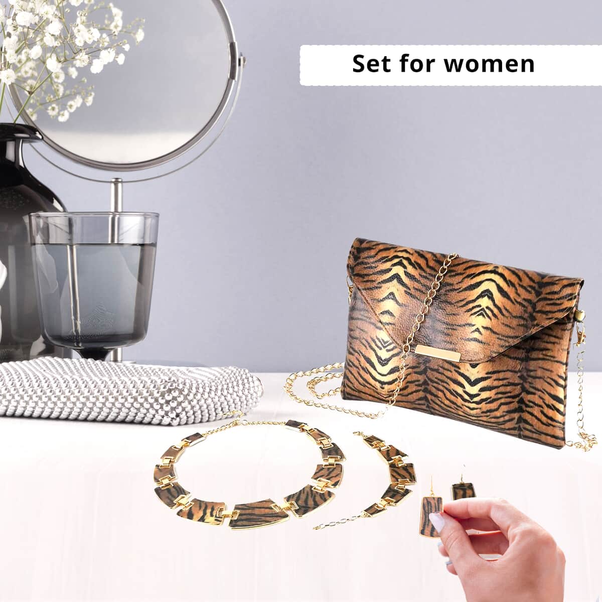 TLV Brown and Black Tiger Print Faux Leather Clutch Bag (25"x18"x2") with Necklace (20-22 Inches), Bracelet (7.25-9.5In) and Earrings in Goldtone image number 1