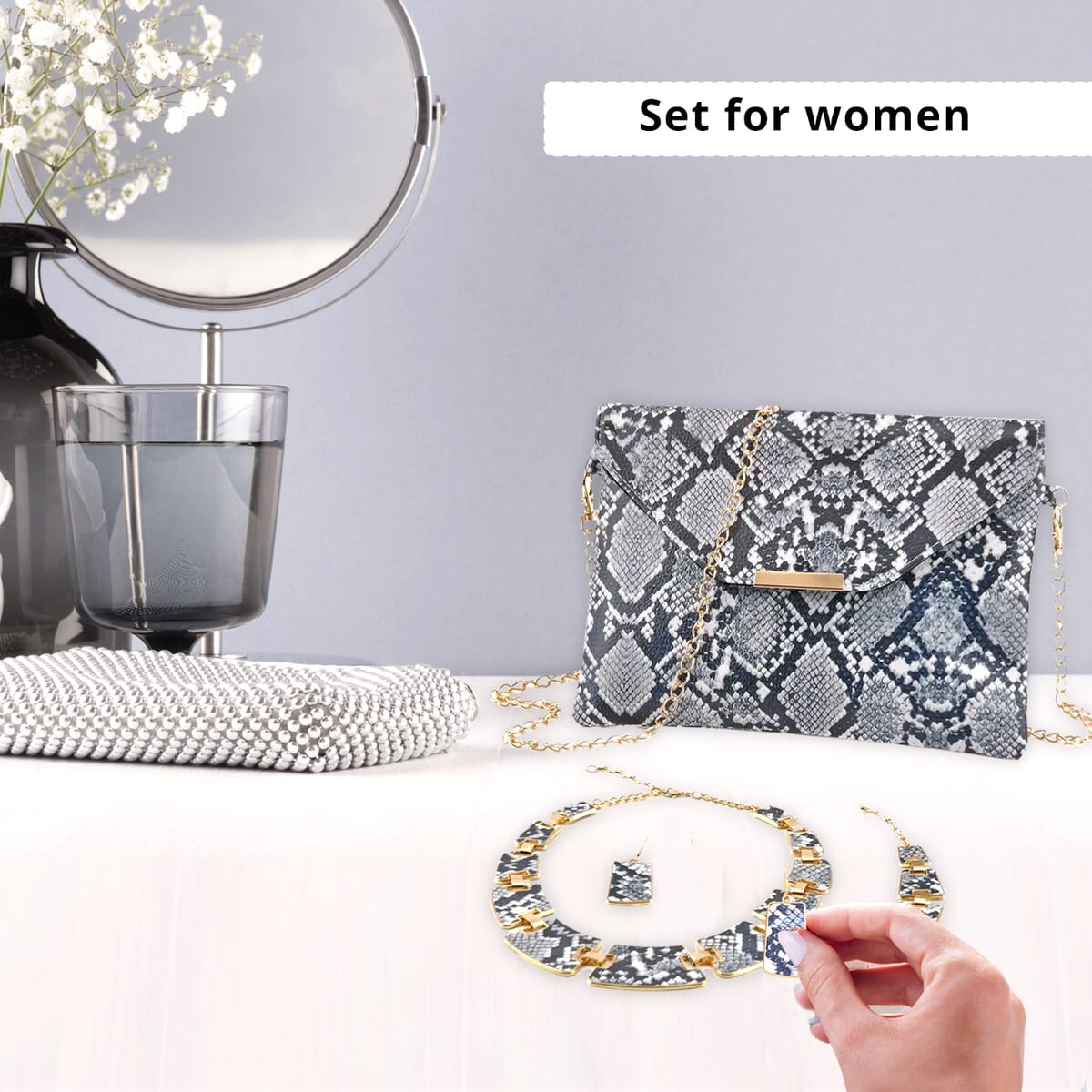Black and White Snake Print Faux Leather Clutch Bag (25x18x2) with Necklace (20-22 Inches), Bracelet (7.25-9.5In) and Earrings in Goldtone image number 1