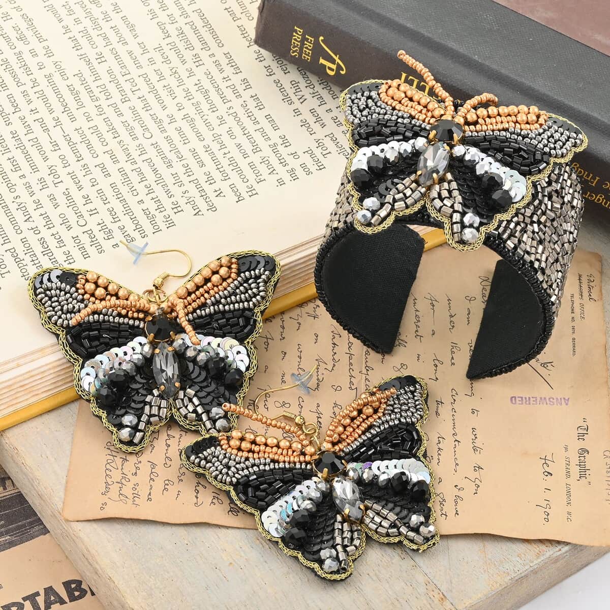 Set of 2 Black Seed Beaded Butterfly Cuff Bracelet and Earrings in Goldtone image number 1