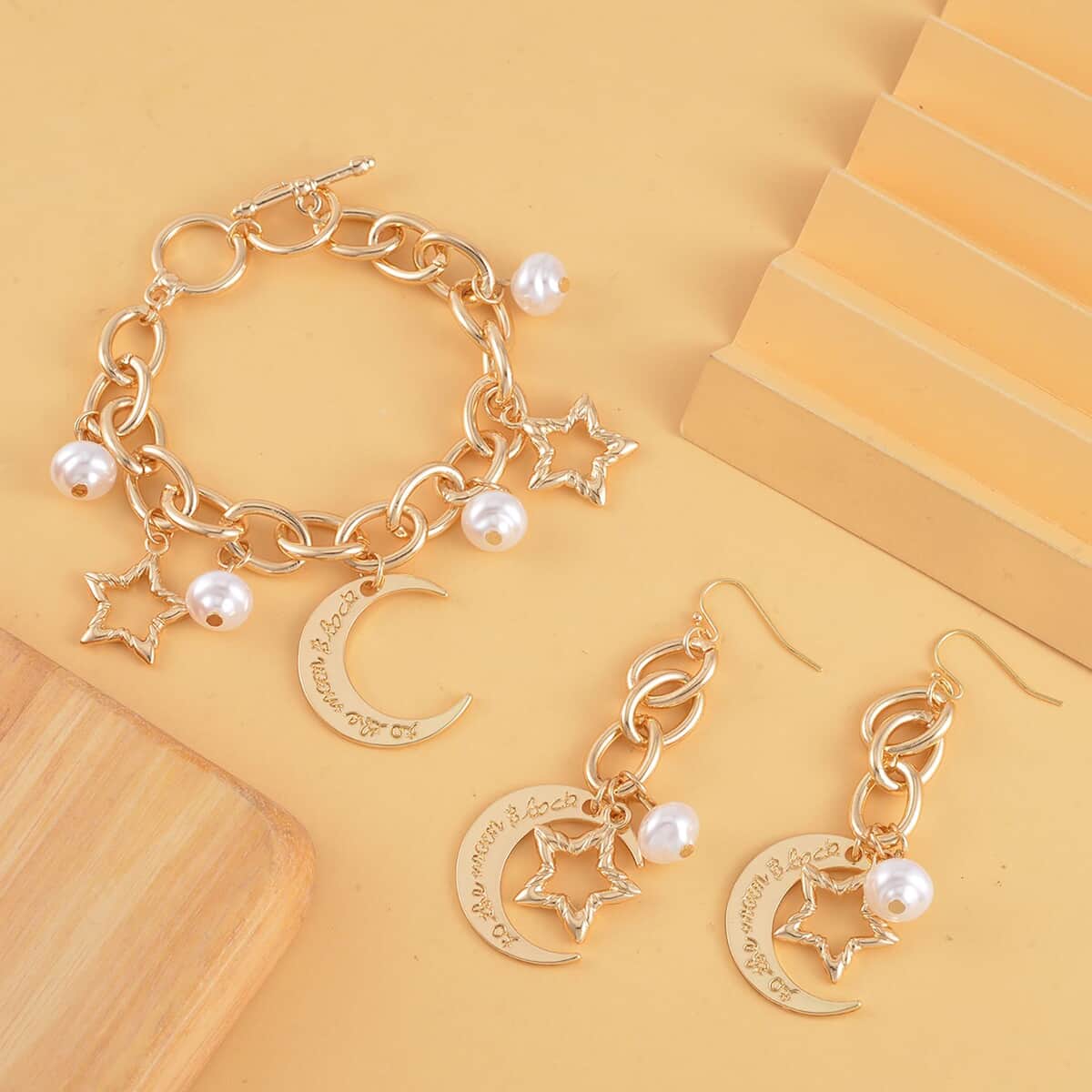 Simulated Pearl Moon Star Bracelet (7.50-8.50In) and Earrings in Goldtone image number 1