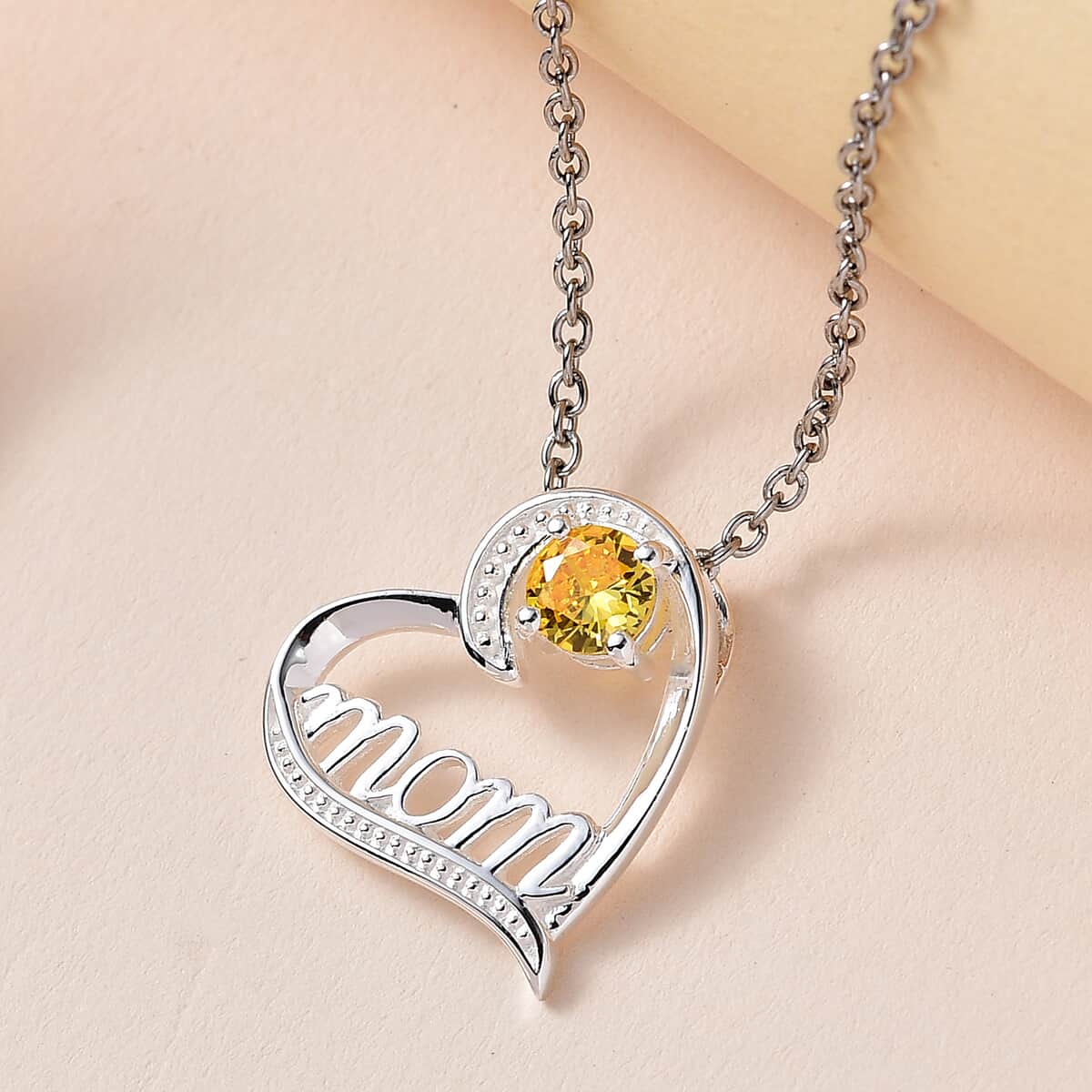 Simulated Yellow Diamond Mom Heart Pendant in Sterling Silver with Stainless Steel Necklace 20 Inches 0.75 ctw image number 1