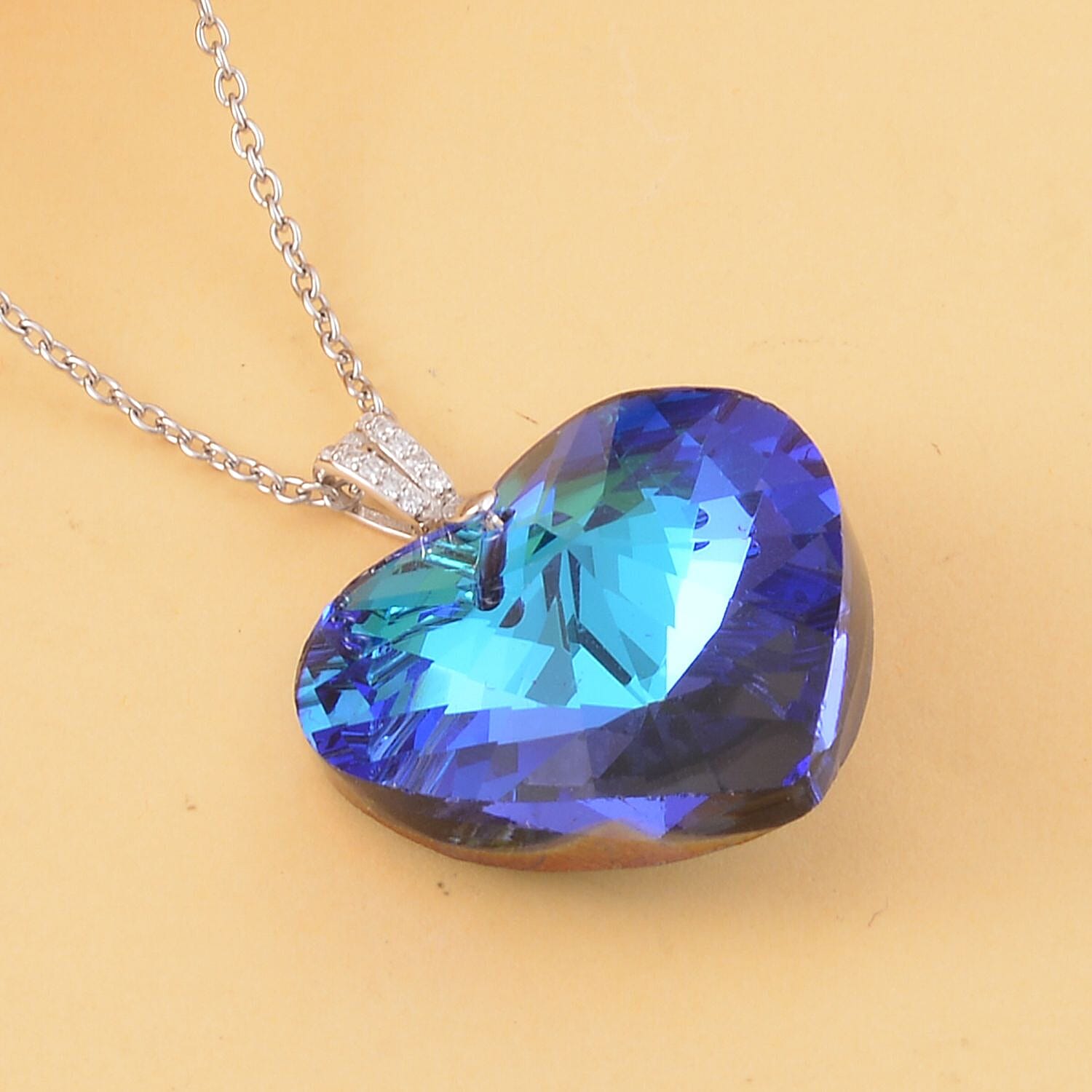 Simulated Blue Sapphire Heart Pendant in Rhodium Over Sterling Silver with Stainless Steel Necklace 20 Inches
