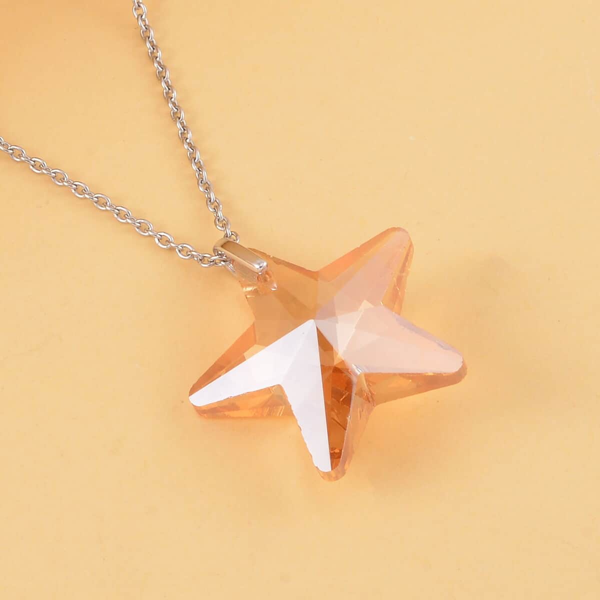 Simulated Champagne Quartz Star Pendant in Rhodium Over Sterling Silver with Stainless Steel Necklace 20 Inches image number 1