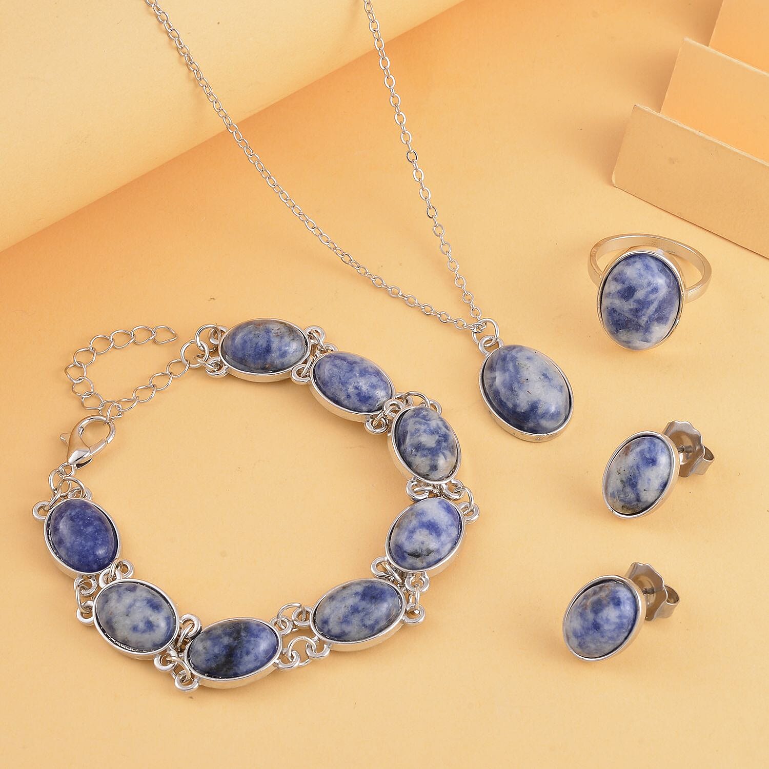 Sodalite Bracelet (7.5-9.5In), Stud Earrings, Ring (Size 5.0) and Pendant Necklace 18 Inches in Silvertone 110.00 ctw