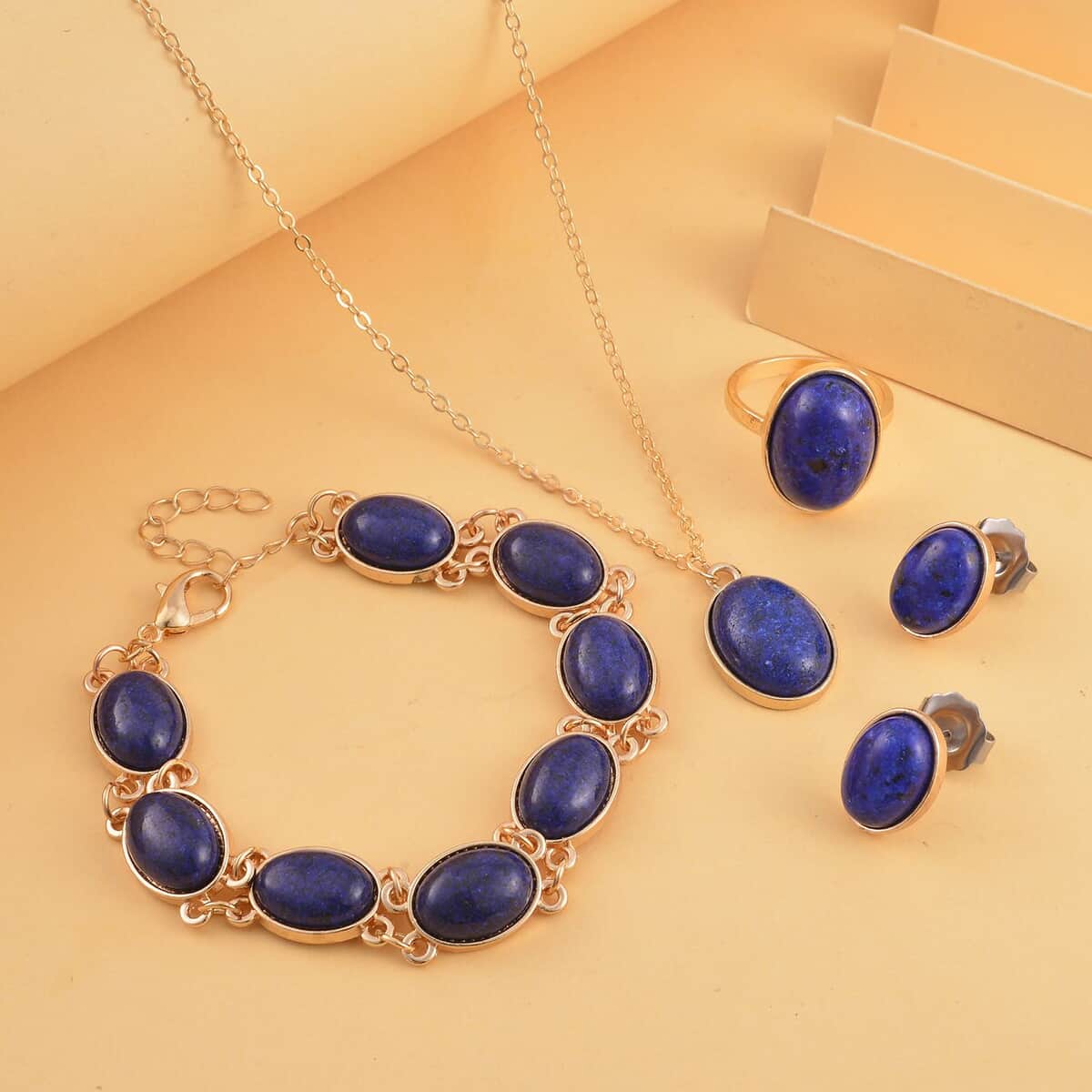 Lapis Lazuli 110.00 ctw Bracelet (7.5-9.5In), Stud Earrings, Ring (Size 8.0) and Pendant Necklace in Goldtone 18 Inches image number 1