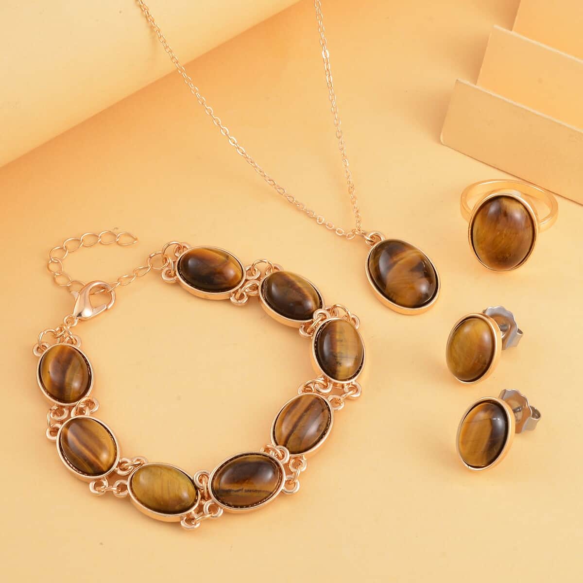 Yellow Tiger's Eye Bracelet (7.5-9.5In), Stud Earrings, Ring (Size 7.0) and Pendant Necklace 18 Inches in Goldtone 110.00 ctw image number 1