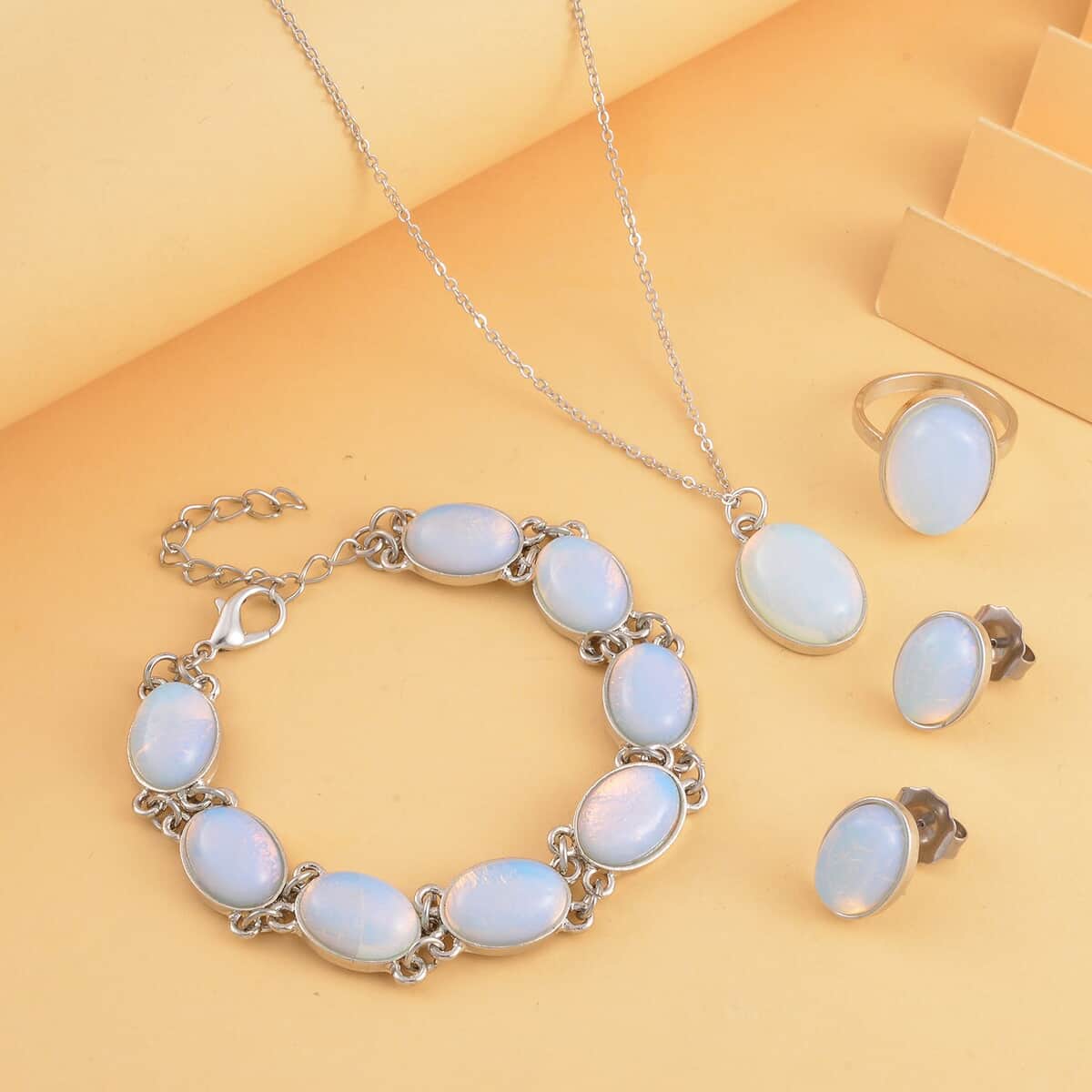 Opalite Bracelet (7.5-9.5In), Stud Earrings, Ring (Size 10.0) and Pendant Necklace 18 Inches in Silvertone 110.00 ctw image number 1