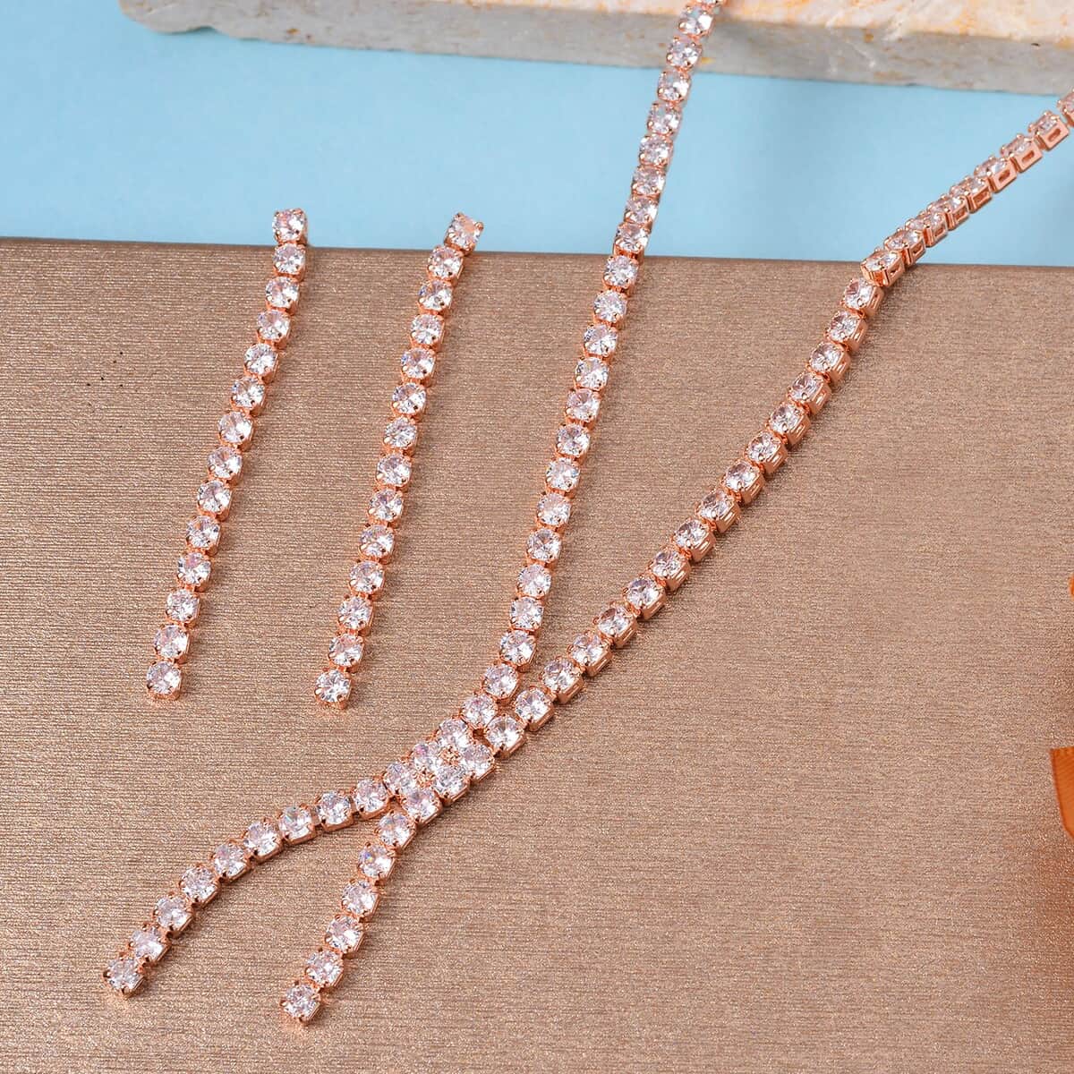 Simulated Diamond Tennis Necklace 18-20 Inches and Dangle Earrings in Rosetone image number 1