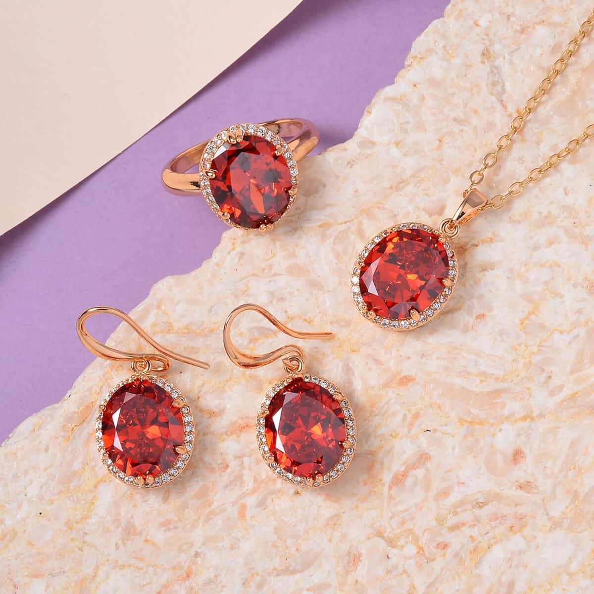 Simulated Red and White Diamond Earrings, Halo Ring (Size 6.0) and Pendant Necklace in Rosetone 20-22 Inches image number 1