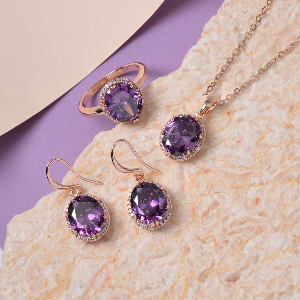 Simulated Amethyst Color and White Diamond Earrings, Halo Ring (Size 6.0) and Pendant Necklace 20-22 Inches in Rosetone image number 1