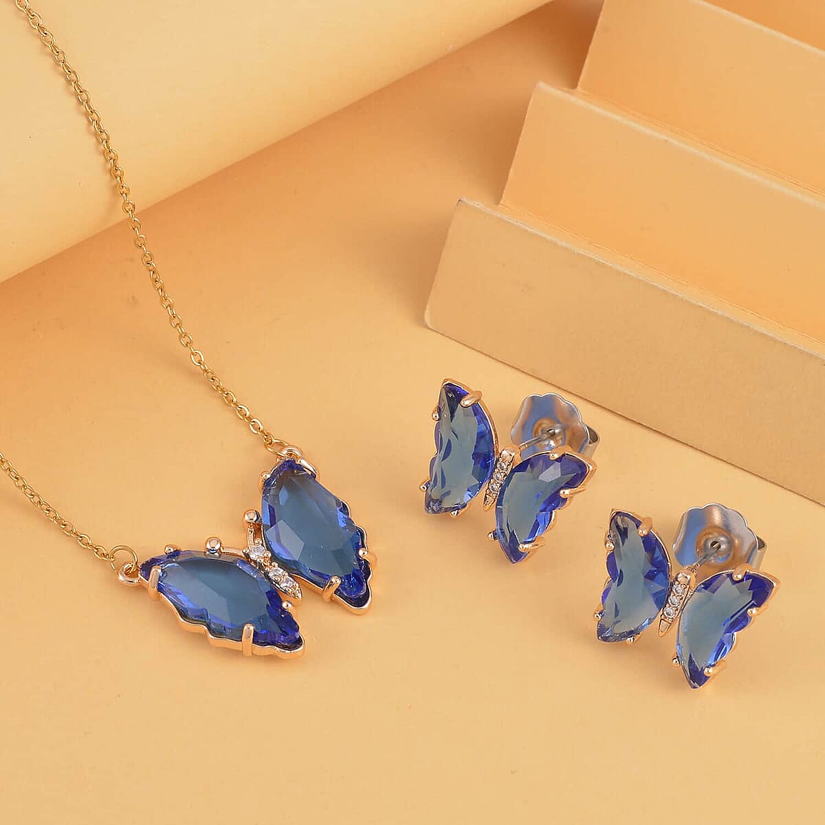 Simulated Blue Sapphire, Simulated Diamond Butterfly Earrings and Necklace 20-22 Inches in Goldtone image number 1