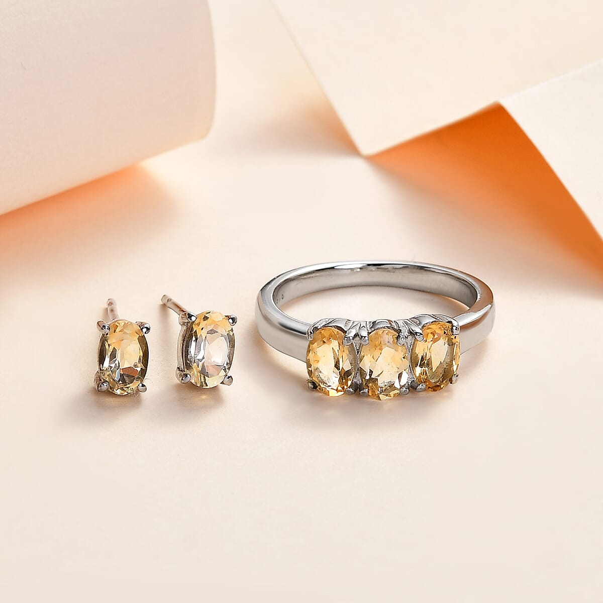 Brazilian Citrine 3 Stone Ring (Size 7.0) and Solitaire Stud Earrings in Stainless Steel 2.20 ctw image number 1