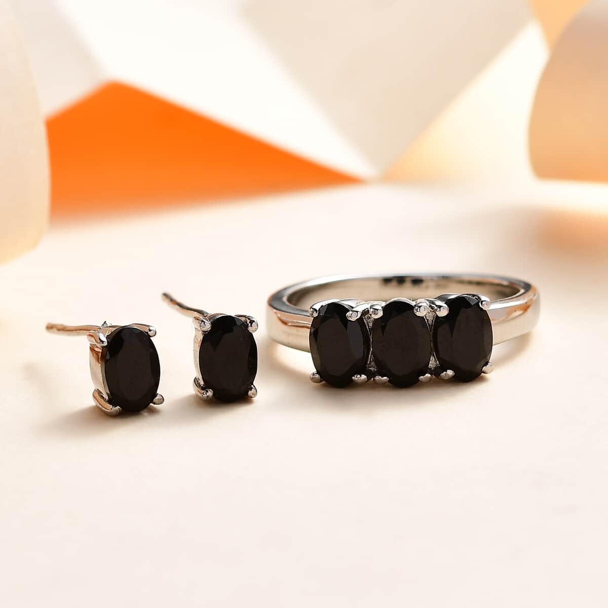 Thai Black Spinel 3 Stone Ring (Size 9.0) and Solitaire Stud Earrings in Stainless Steel 2.75 ctw image number 1