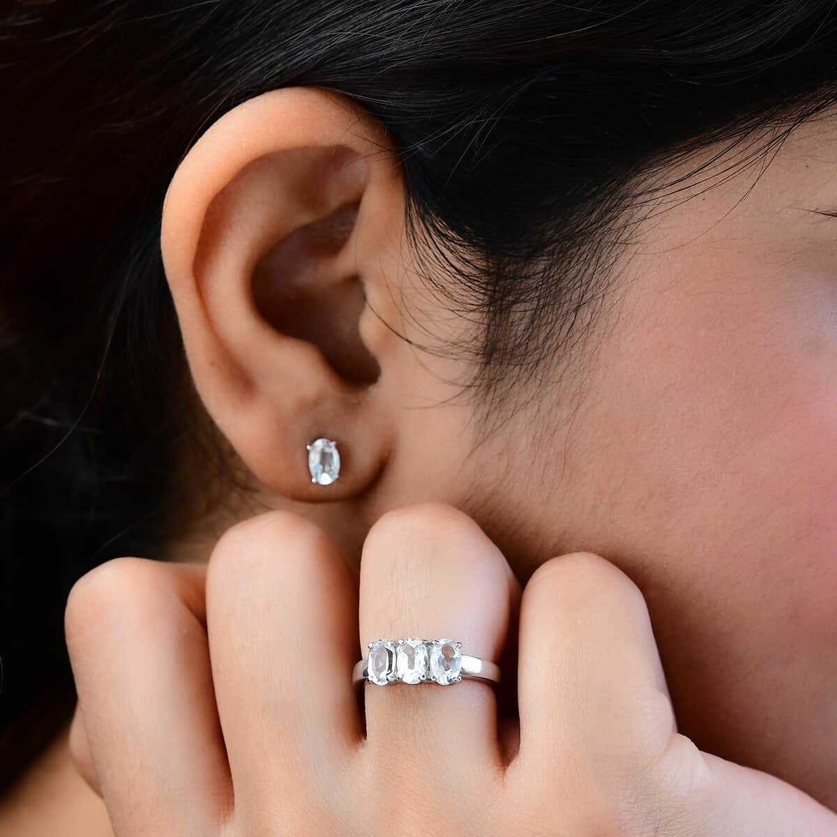 White Topaz 3 Stone Ring (Size 8.0) and Solitaire Stud Earrings in Stainless Steel 2.50 ctw image number 2