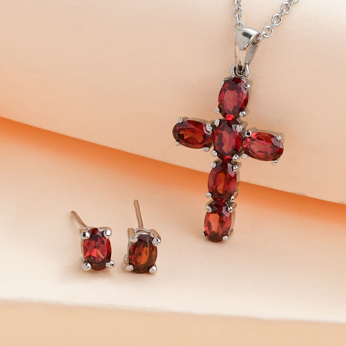 Mozambique Garnet 4.50 ctw Stud Earrings and Cross Pendant Necklace 20 Inches in Stainless Steel image number 1