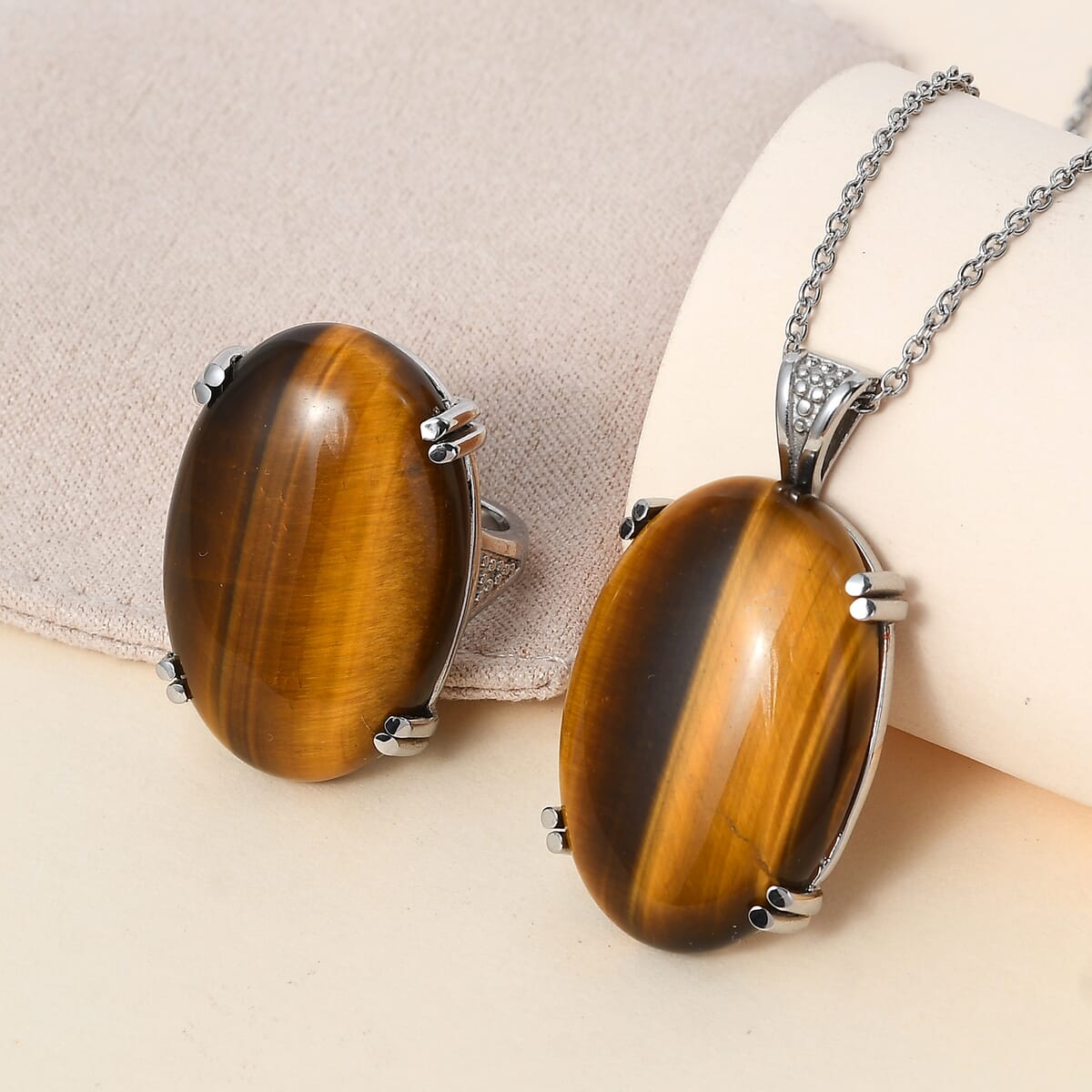 Tiger's Eye Solitaire Ring (Size 5.0) and Pendant Necklace (20 Inches) in Stainless Steel 65.75 ctw image number 1