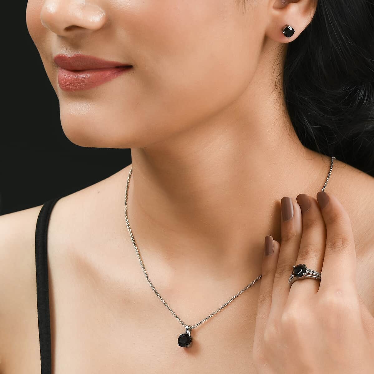 Natural Thai Black Spinel Solitaire Ring , Pendant and Solitaire Stud Earrings in Stainless Steel 7.15 ctw image number 3