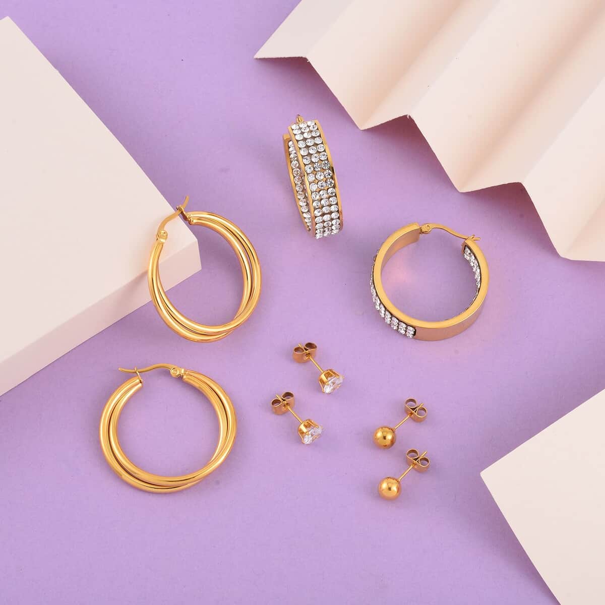 Evertrue Set of 4 pairs Simulated Diamond, Austrian Crystal Hoops and Stud Earrings in ION Plated Yellow Gold Stainless Steel image number 1