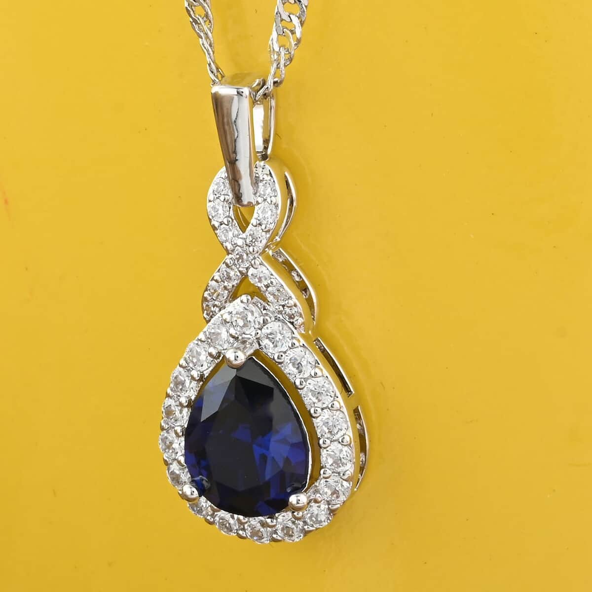 Simulated Blue Diamond and Simulated Diamond Pendant Necklace 18 Inches in Silvertone 2.00 ctw image number 1