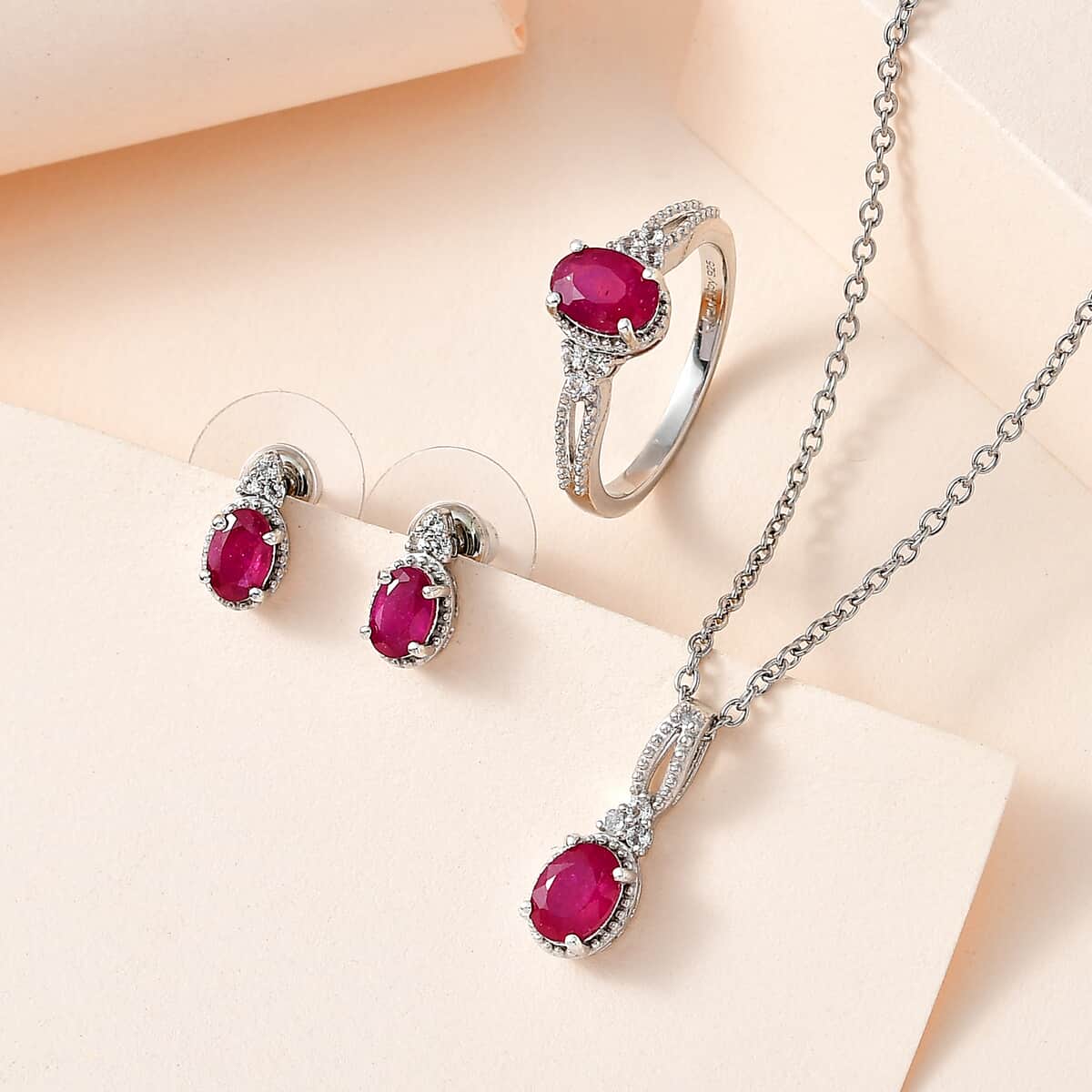 Niassa Ruby (FF), White Topaz Stud Earrings, Ring (Size 6.0) and Pendant in Platinum Over Sterling Silver with Stainless Steel Necklace 20 Inches 2.40 ctw image number 1