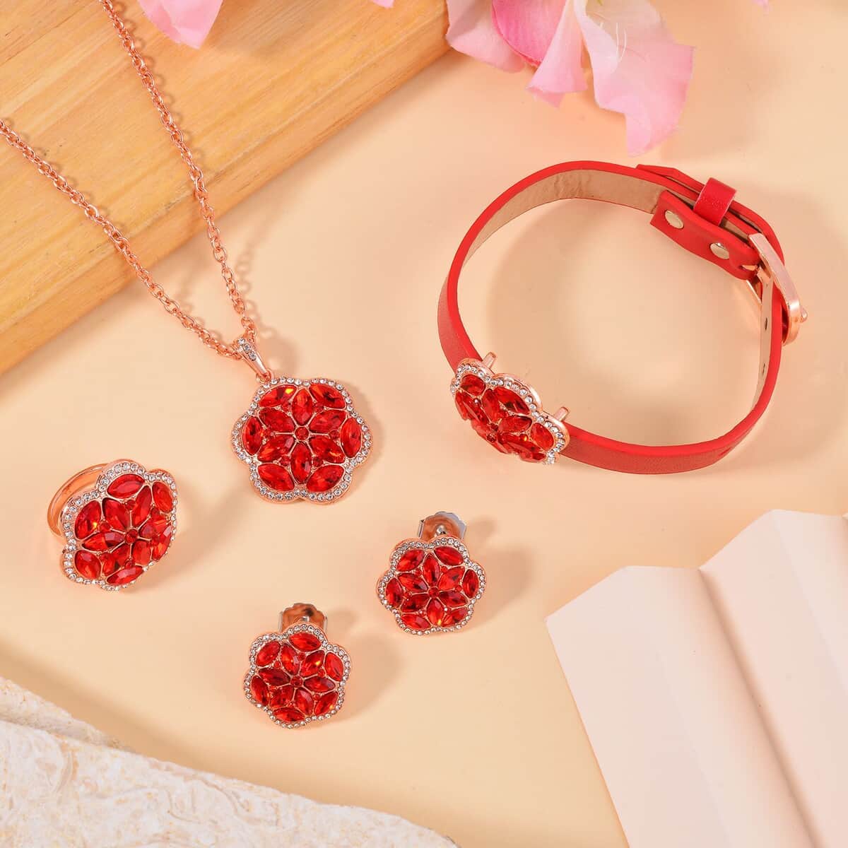 Red and White Austrian Crystal, Faux Leather Floral Bracelet (6-8In), Earrings, Ring (Size 6.0) and Pendant Necklace 20-22 Inches In Rosetone image number 1