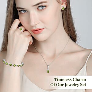 Peridot, White Topaz 3 Stone Ring (Size 8.00), Stud Earrings, Bracelet (7.25In) and Pendant in Platinum Over Sterling Silver 18.85 ctw