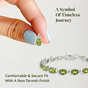 Peridot, White Topaz 3 Stone Ring (Size 8.00), Stud Earrings, Bracelet (7.25In) and Pendant in Platinum Over Sterling Silver 18.85 ctw
