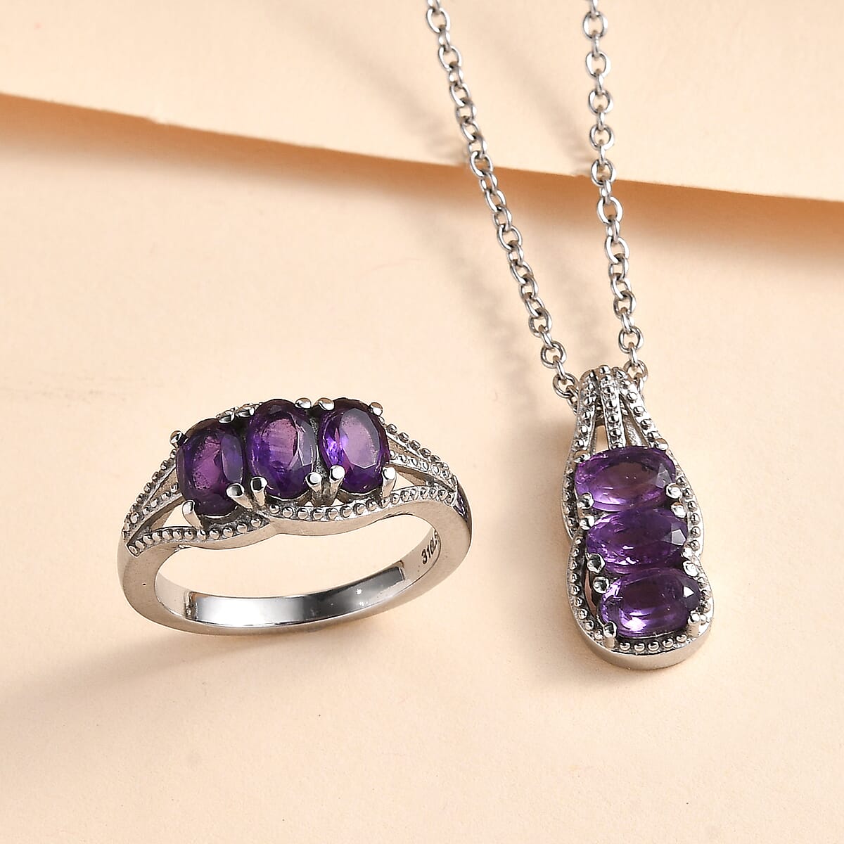 Amethyst 2.75 ctw 3 Stone Ring Size 6 and Pendant Necklace 20 Inches in Stainless Steel image number 1