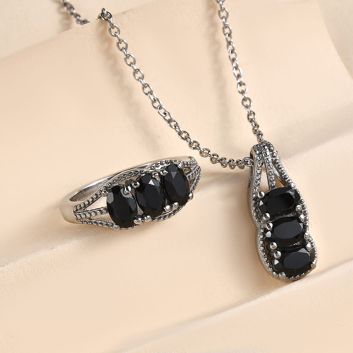 Thai Black Spinel 2.75 ctw 3 Stone Ring Size 5 and Pendant Necklace 20 Inches in Stainless Steel image number 1