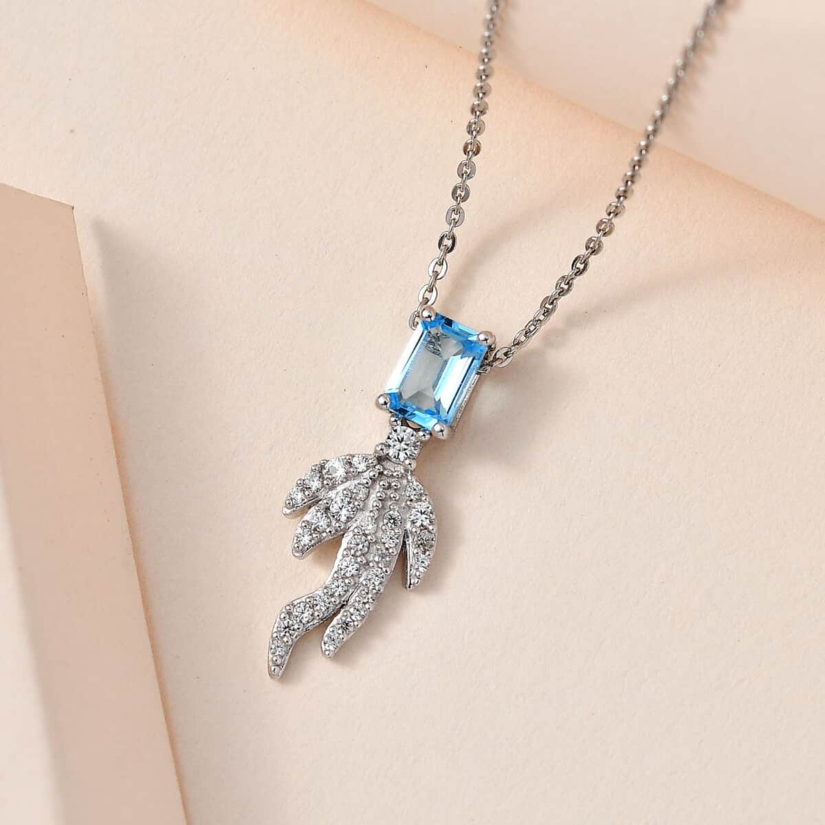 Blue Topaz and White Zircon Fish Tail Pendant Necklace 20 Inches in Platinum Over Sterling Silver 1.10 ctw image number 1