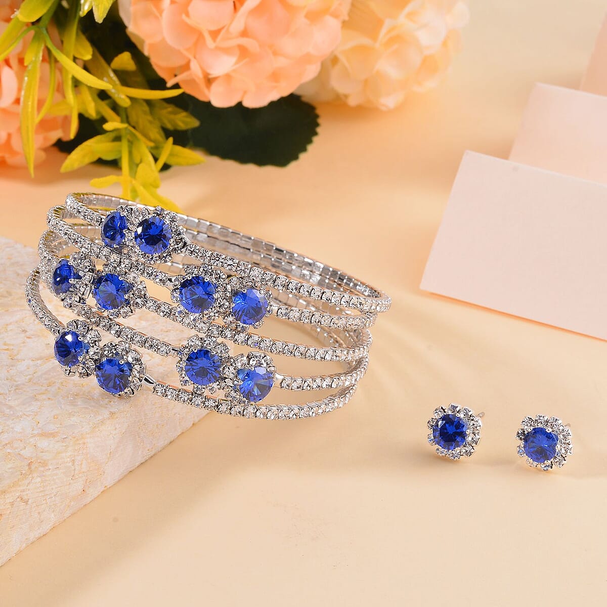 White and Blue Color Austrian Crystal Bangle Bracelet (7-7.5 In) and Earrings in Silvertone image number 1