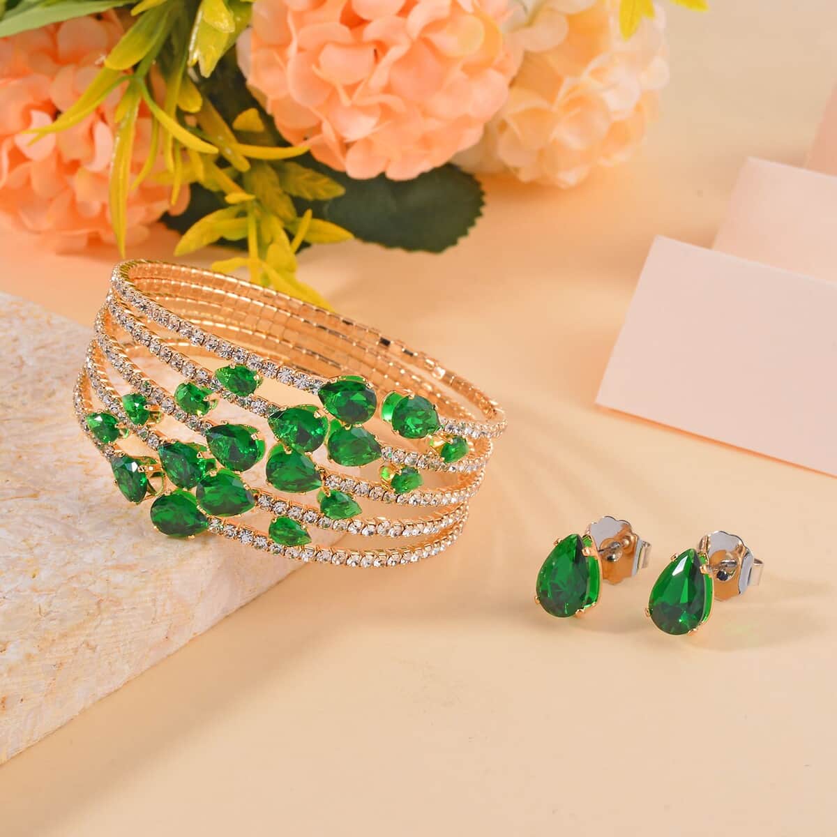 Green and White Austrian Crystal Bangle Bracelet (7-7.50 In) and Earrings in Goldtone image number 1